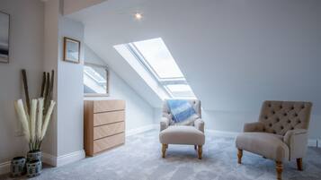 4 bedrooms, premium bedding, iron/ironing board, bed sheets