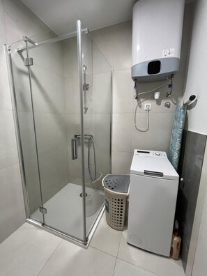 Superior Apartment, 1 Bedroom, Balcony, City View | Bathroom | Shower, rainfall showerhead, hair dryer, towels
