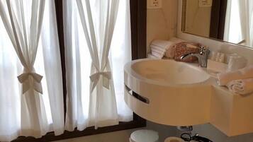 Traditional Suite, 1 Queen Bed with Sofa bed, Non Smoking, Garden View | Bathroom | Free toiletries, hair dryer, slippers, bidet