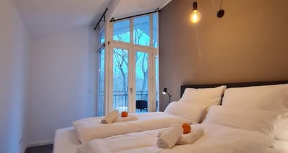 Penthouse in Waterfront Villa Including Wifi Parking Balcony Netflix