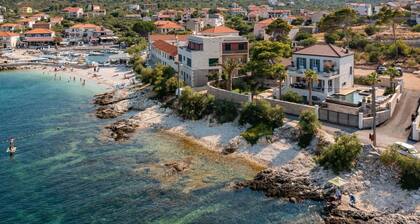 Luxury beachfront villa Sensation with private heated pool, sauna, gym, and jacuzzi on Ciovo