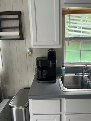 Fridge, microwave, coffee/tea maker, toaster