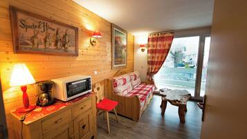 Televisión de pantalla plana de 80 cm con canales digitales