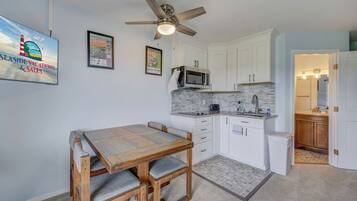 Mini-fridge, microwave, stovetop, coffee/tea maker