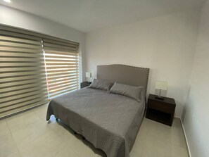 컴포트 콘도 | 2 개의 침실, 무료 WiFi, 침대 시트