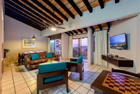 50-inch flat-screen TV with cable channels, TV - WIVC Alta Vista Condo - Stunning Views, Close to the Beach & Romantic Zone (Puerto Vallarta)
