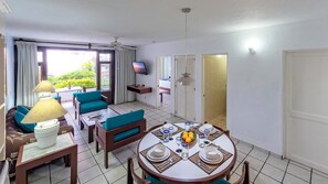 50-inch flat-screen TV with cable channels, TV - WIVC Alta Vista Condo - Stunning Views, Close to the Beach & Romantic Zone (Puerto Vallarta)