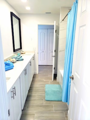 Hair dryer, towels, soap, shampoo