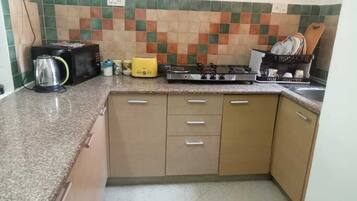 Fridge, microwave, stovetop, electric kettle