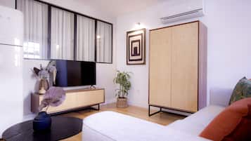 City Apartment | Living area | 43-inch LED TV with cable channels, TV