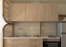Una cocina moderna con armarios de madera, un lavamanos de acero inoxidable y un horno empotrado.