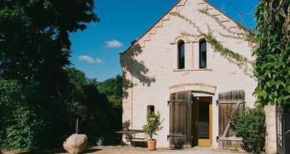 REMISE STUDIO: Gartenblick, Balkon und Wasserzugang