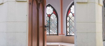 TURMVILLA upper floor: balcony, wood-burning stove and water access