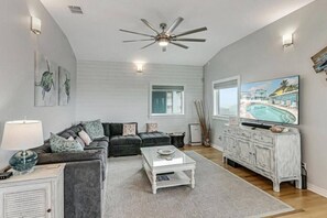 Flat-screen TV - Wake Up to Ocean Breezes: Elevator Access, Beach Views, and a Boardwalk to Paradise. (Port Aransas)