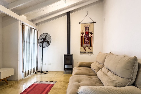 Basic Villa | Living area | 50-inch TV with cable channels