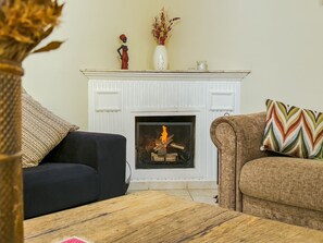 Basic Villa | Living area | 42-inch TV with cable channels