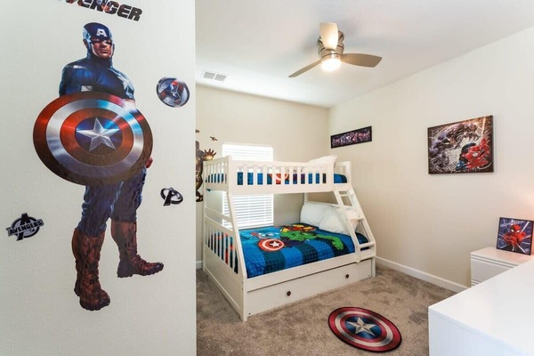Exciting superhero-themed room with bunk beds, perfect for young adventurers!