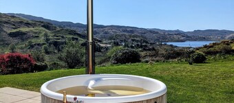 Beautifully positioned farmhouse overlooking hills and sea