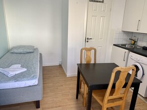 Apartment, Multiple Beds | Dining - Apartment in Hagersten Stockholm (Hägersten)