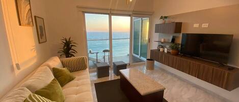 Family Condo | Living area | 35-inch TV with cable channels