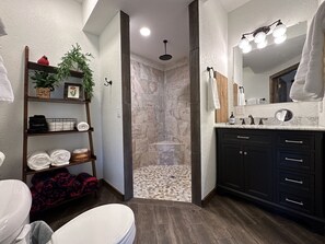 Bathtub, hair dryer, towels