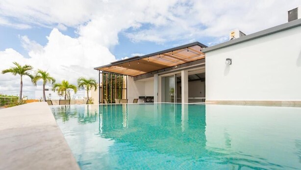 Unclassified image, 1 of 5, button - Amazing Apartment with roof top pool near 5th Av  (Playa del Carmen)