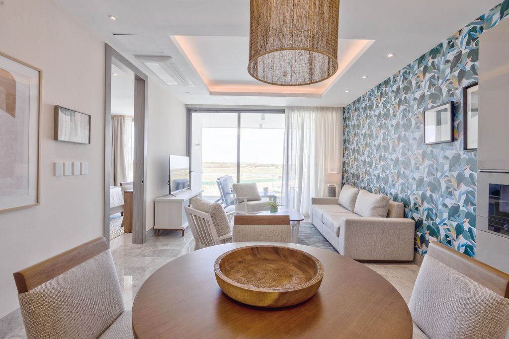 Appartement Confort | Coin séjour | TV connectée