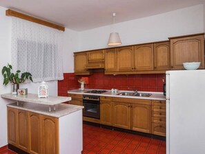 Fridge, oven, electric kettle, cookware/dishes/utensils