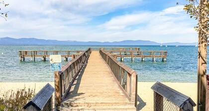 Spacious condo in lakefront complex with fireplace, balcony, pool, & hot tub