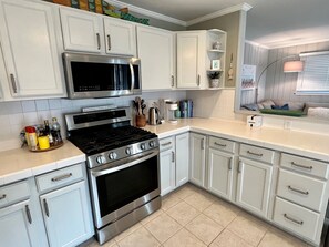 Fridge, microwave, oven, stovetop - Avalon 3BR Bayside Retreat: Sleeps 7, Large Porch, Outdoor Shower & Grill (Avalon)