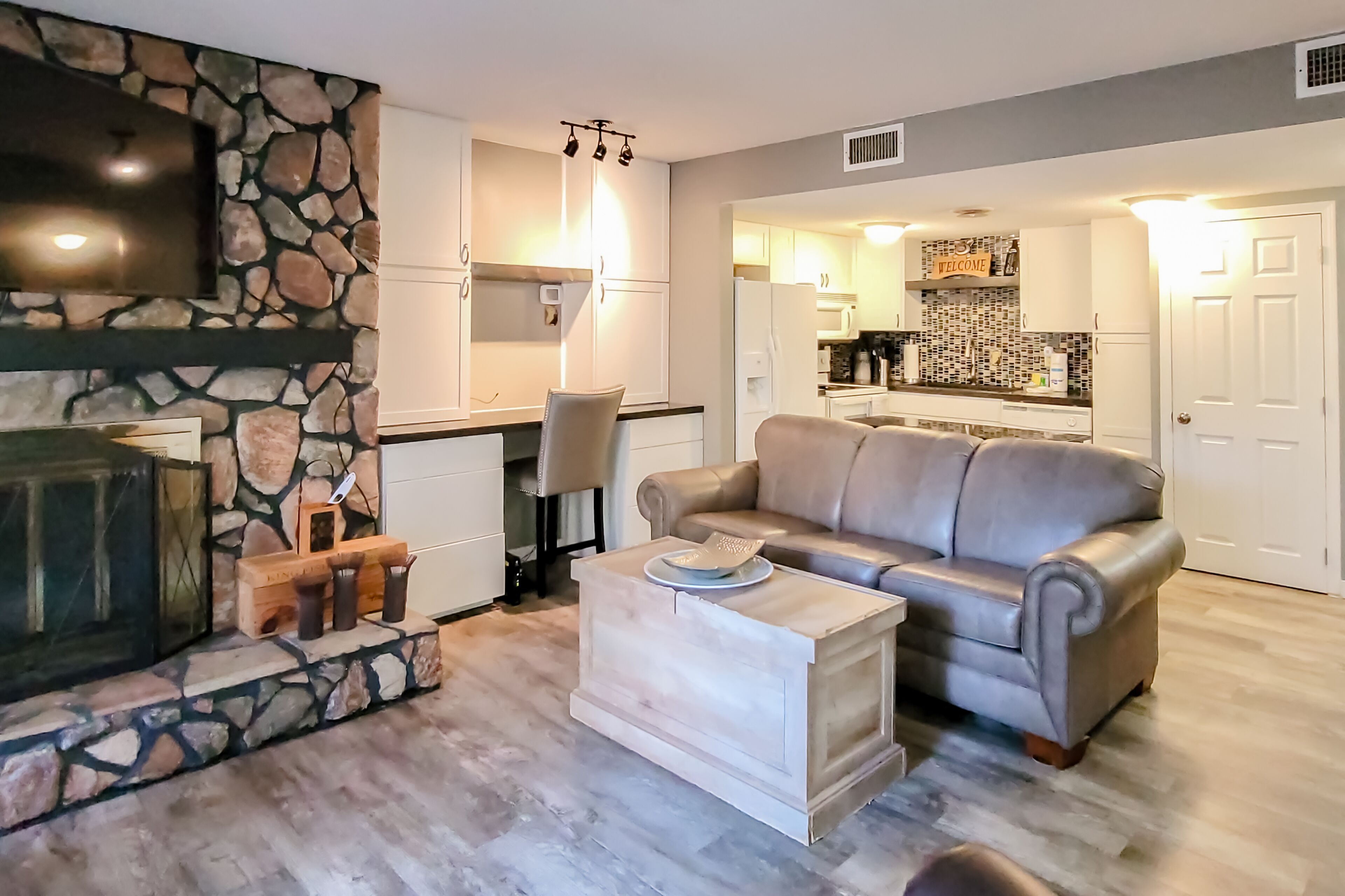 Rural condo with wood fireplace, outdoor pool, grill area, deck, W\/D, fast WiFi