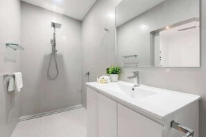 Shower, hair dryer, shampoo