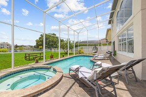 Outdoor pool, a heated pool, pool loungers - Splendid Lake View Villa With Heated Pool/spa Near Disney (Davenport)