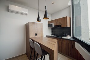 Premium Loft, 1 Bedroom | Private kitchen | Full-size fridge, microwave, espresso maker, coffee/tea maker