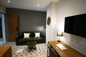 Premium Loft, 1 Bedroom | Living area | 40-inch Smart TV with digital channels, TV, heated floors - Punto Lofts Periférico Sur (Mexico City)