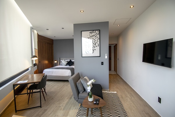 Premium Loft, 1 Bedroom | 1 bedroom, down comforters, pillowtop beds, in-room safe