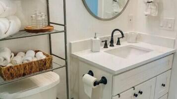 Hair dryer, towels, soap, toilet paper