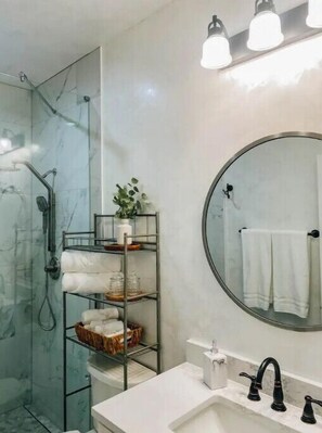 Hair dryer, towels, soap, toilet paper