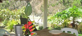 Bungalow directly on the river Bungalow directly on the river with bathing area 