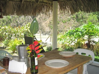 Bungalow directly on the river Bungalow directly on the river with bathing area 