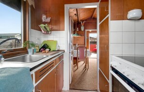 Fridge, stovetop, coffee/tea maker, cookware/dishes/utensils
