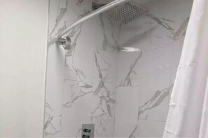Hair dryer, towels, soap, shampoo