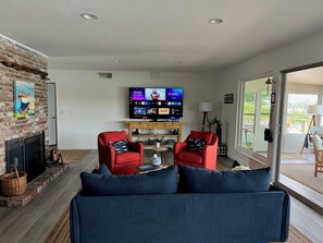 Smart TV, fireplace, books