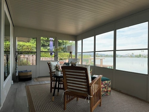 WATCH THE SETTING SUN &<br>THE MARIN MOUNTAINS OR KAYAK THE <br>LAGOON from the dock