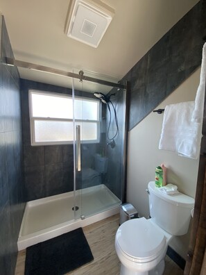 Shower, towels, soap, shampoo