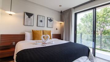 2 quartos, cofres nos quartos, ferros/tábuas de passar roupa, Wi-Fi