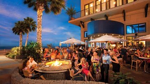 Outdoor dining - Four Sails - Oceanfront & City View Balconies! (Virginia Beach)