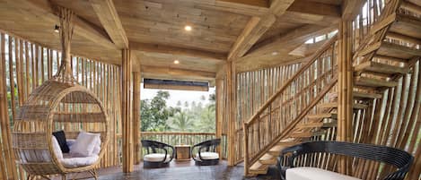 One Bedroom Bamboo Villa with Pool | Living area | Fireplace