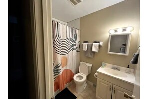 Shower, towels, soap, shampoo
