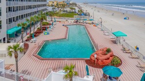 A hotel with a rooftop pool, beach access, and a view of the ocean. - Stunning direct oceanfront views from your own balcony! (Daytona Beach)